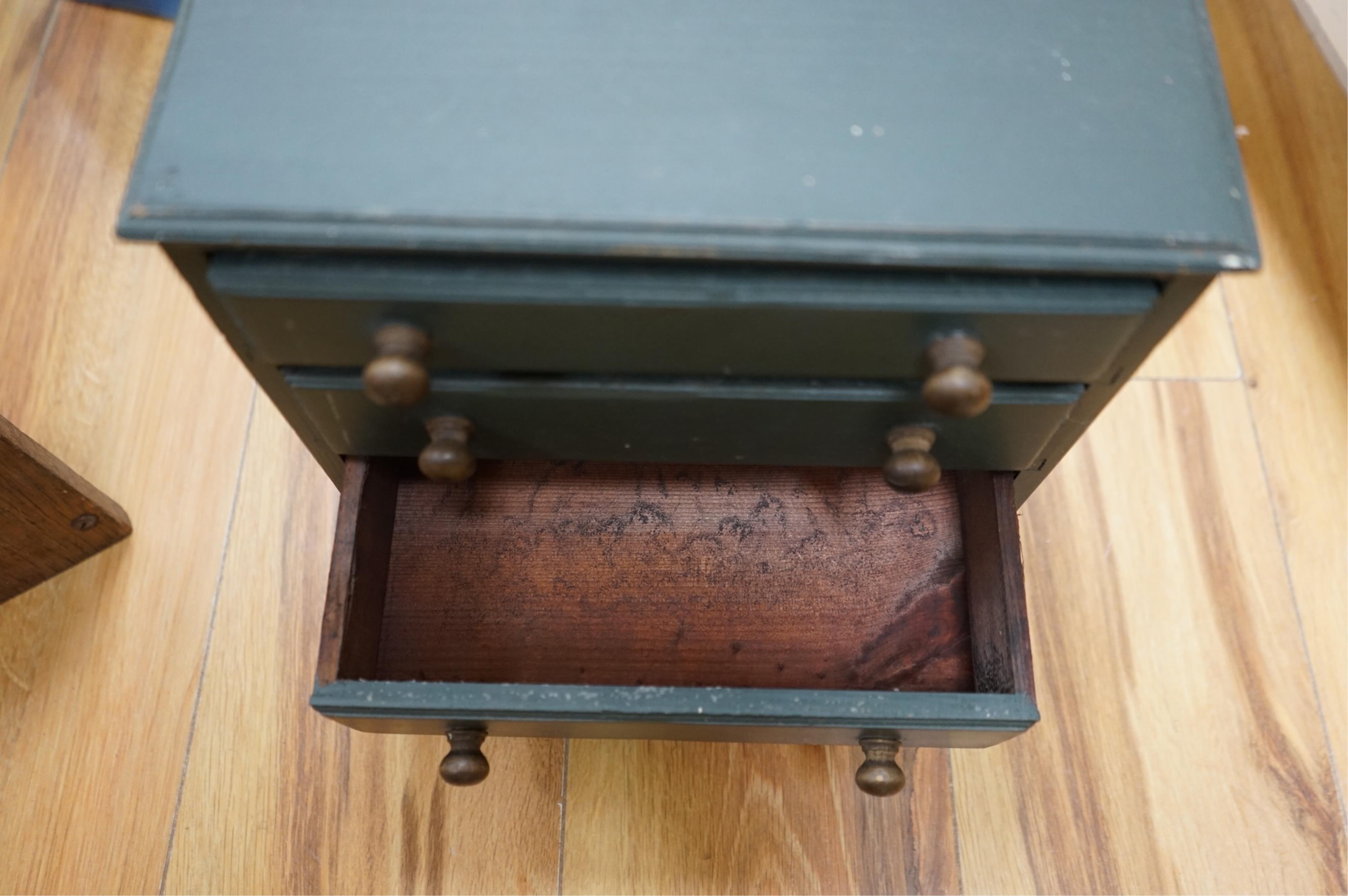 A painted pine miniature chest of drawers, various boot trees etc, chest 26cm x 26cm